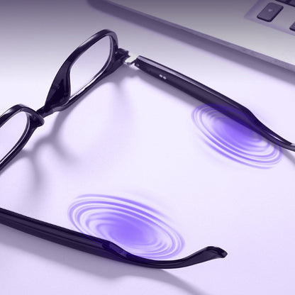 VocaLens AI Smart Sunglasses with clear photochromic lenses Black glasses with UV light emission on a white surface